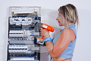 Skilled woman electrician