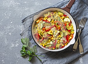 Skillet vegetarian vegetable fajitas on the gray table