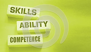 Skills ability competence words in wooden blocks concept. Career and business success concept