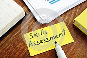 Skills Assessment concept. Yellow piece of paper