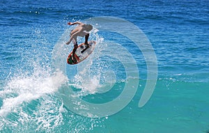 Skimboarder at Aliso Beach, Laguna Beach, CA