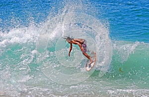 Skimboarder at Aliso Beach, Laguna Beach, CA