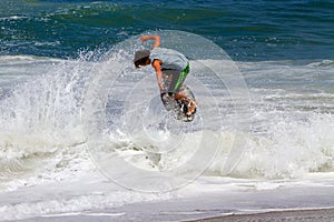 Skimboarder Competes
