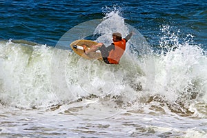 Skimboarder Competes