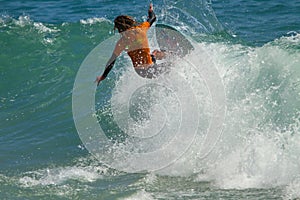 Skimboarder Competes