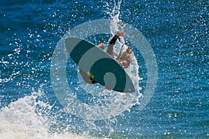 Skimboarder Competes