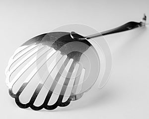 Skimmer fry ladle on white background