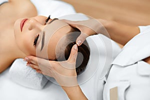 Skin, Body Care. Woman Getting Beauty Spa Face Massage. Treatment.