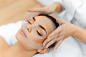 Skin, Body Care. Woman Getting Beauty Spa Face Massage. Treatment.