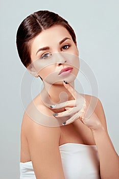 Skin care. Beauty Concept. Beautiful Young Woman with Clean Fresh Skin.