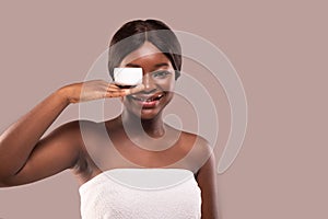 Skin Care. Beauty Portrait Of Black Woman Holding Jar With Moisturising Cream
