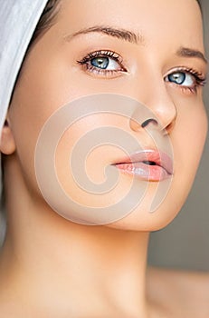 Skin care and beauty routine, beautiful woman with white towel wrapped around head, skincare cosmetics and face