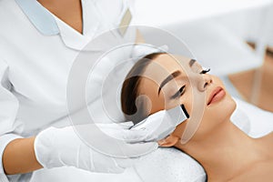 Skin Care. Ultrasound Cavitation Facial Peeling. Skin Cleansing photo