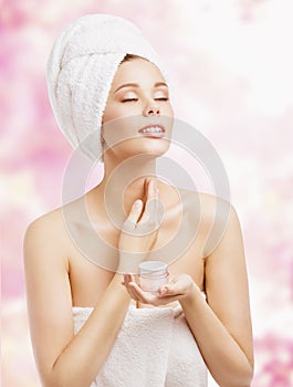 Skin Care, Woman Applying Cream in Bath Towel after Spa, Treatment Cosmetic Moisturizing Lotion