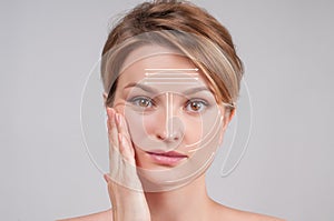 Skin Care. Woman with perfectly clean skin and massage facial lines