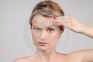 Skin Care. Woman with perfectly clean skin and massage facial lines