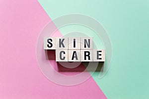 Skin Care word concept on cubes photo