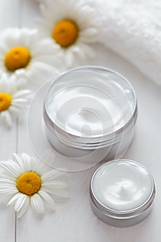 Skin cleansing cosmetic cream with chamomile flowers vitamin spa lotion