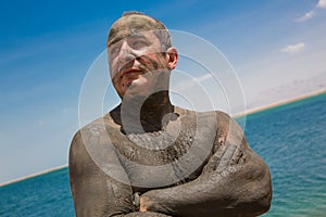 Skin diseases treatment with Dead Sea mud photo