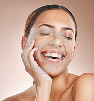 Skincare, beauty and happiness, woman with eyes closed, smile and laughing on studio background at fun spa. Makeup