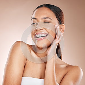 Skincare, beauty and happiness, woman with smile laughing on studio background at fun spa. Makeup, glamour and wink