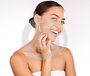 Skincare, beauty and portrait of latin woman on a white background in studio for wellness, spa and body care