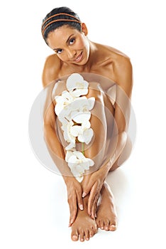 Skincare, beauty and portrait of woman with flowers in studio on a white background mock up. Floral cosmetics, organic