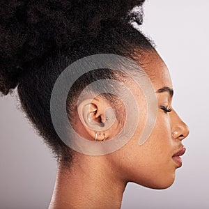 Skincare, beauty and profile of black woman with confidence, white background and cosmetics product. Health, dermatology