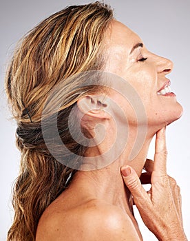 Skincare, beauty and profile of senior woman isolated in studio on gray background. Happiness, healthy skin and wellness