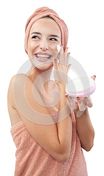 Skincare, cheerful young woman laughing, applying moisturizing cream on face, lotion or mask for skin lifting and anti-aging,