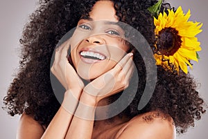 Skincare, face of black woman or sunflower in hair in studio for spring, luxury spa or sustainable. Aesthetic, beauty