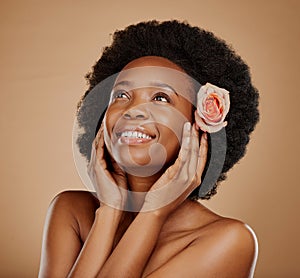 Skincare, flower and young woman in studio with beauty, natural and wellness face routine. Cosmetic, health and African