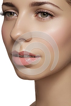 Skincare & make-up. Woman face with clean shiny skin & fresh rouge