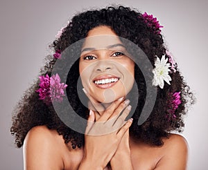 Skincare, smile or face of black woman with flowers in hair for spring, luxury spa or self care. Aesthetic, beauty