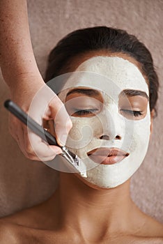 Skincare, smile and woman with face mask at spa for glow, wellness and beauty routine with self care. Cosmetic, natural