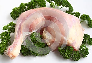 Skinless chicken leg with parsley