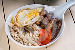Skinless longanisa pork or chicken meat with fried egg