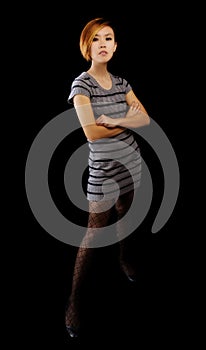 Skinny Asian American Woman Arms Crossed In Knit Dress