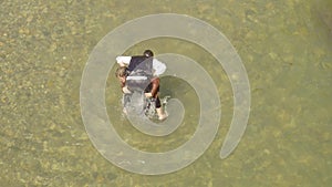 Skinny And Fat Pirates Wrestling On A River