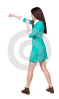 Skinny woman funny fights waving his arms and legs.