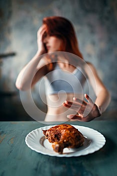 Skinny woman refuses to eat, anorexia