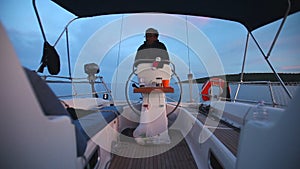 Skipper on sailing boat on Adriatic sea off the coasts of Croatia.