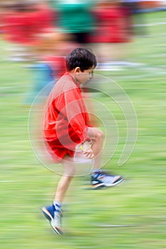 Skipping boy with movement.