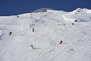 Skisloopes with alpine skiers Gaschurn