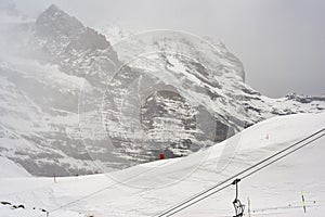 Skislopes above Kleine Scheidegg above Grindelwald with Mt. Eiger, Bernese alps, winter