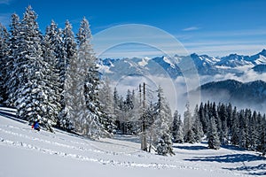 Skitouring in the Allgaeu Alps near Oberstdorf on a beautiful bluebird day in winter