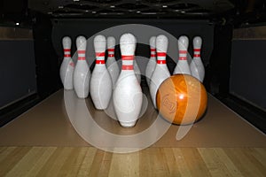 Skittle and bowling ball on wooden bowling alley. Pinsetter photo