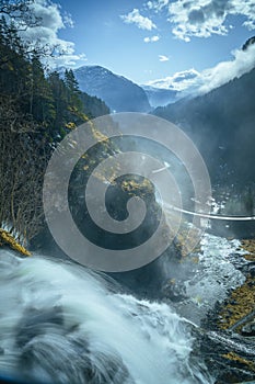 Skjervefossen Waterfall in Spring Landscape photo
