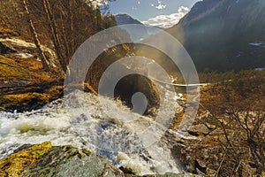 Skjervefossen Waterfall in Spring Landscape photo
