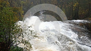 Skjervsfossen waterfall in autumn in the south of Norway